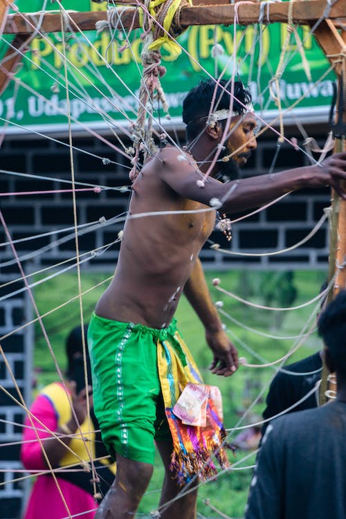 picture of a man with piercings on his body