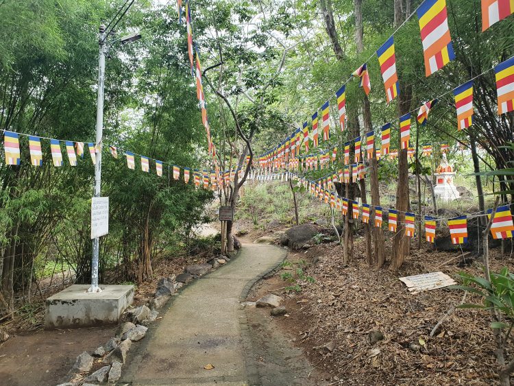 Follow The Flags To Get To Wat Khao Sanam Chai Chedi
