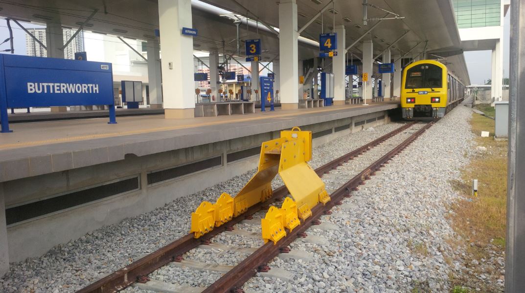 yellow train in Butterworth railway station
